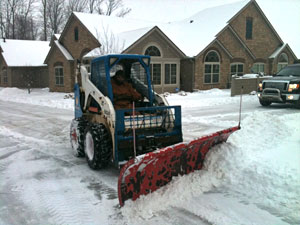 Skid Steer Plowing Sno